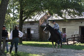 Recruit Elizabeth and Miracle size up the road for ride